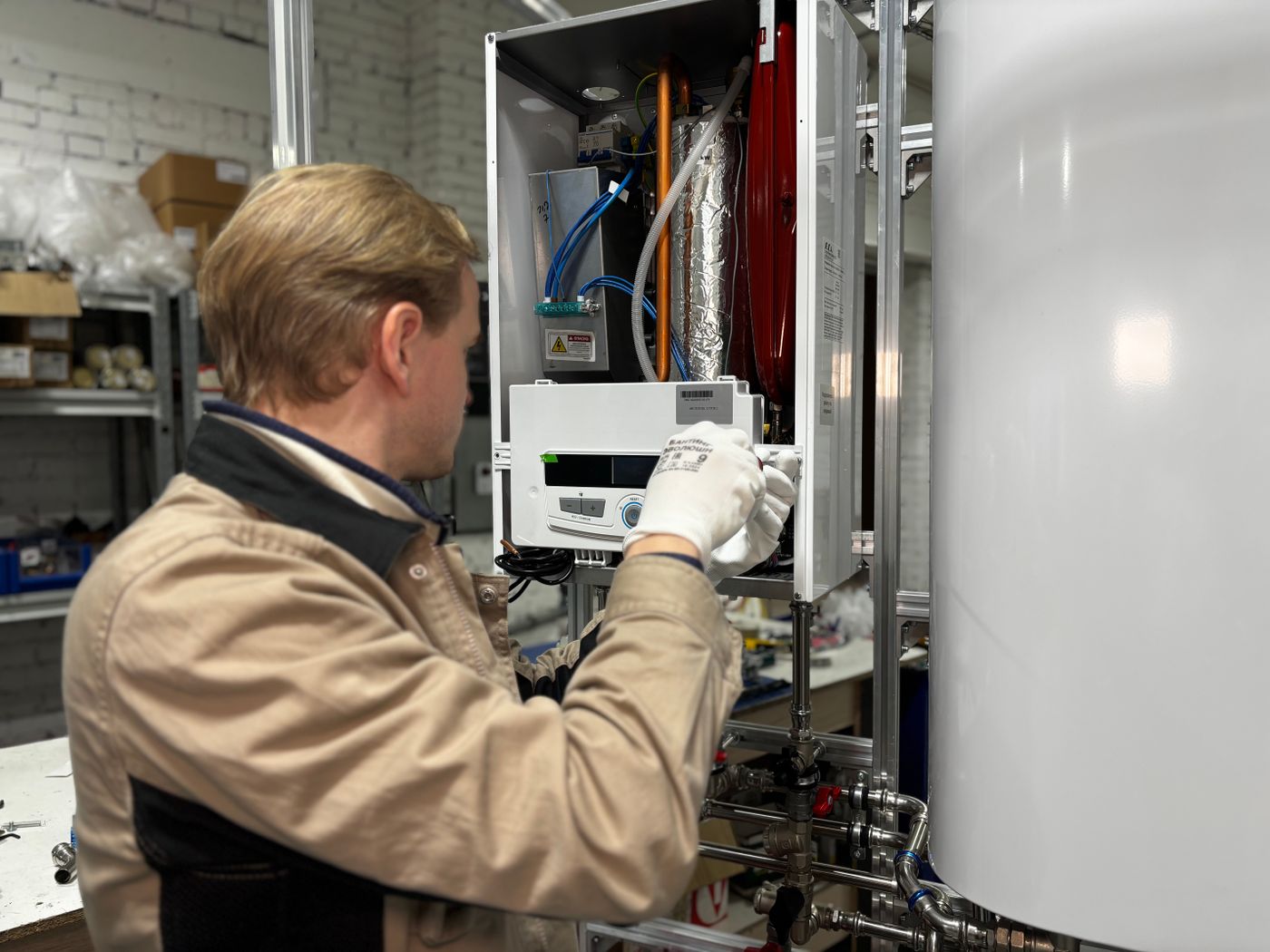 Technician repairing a heating system